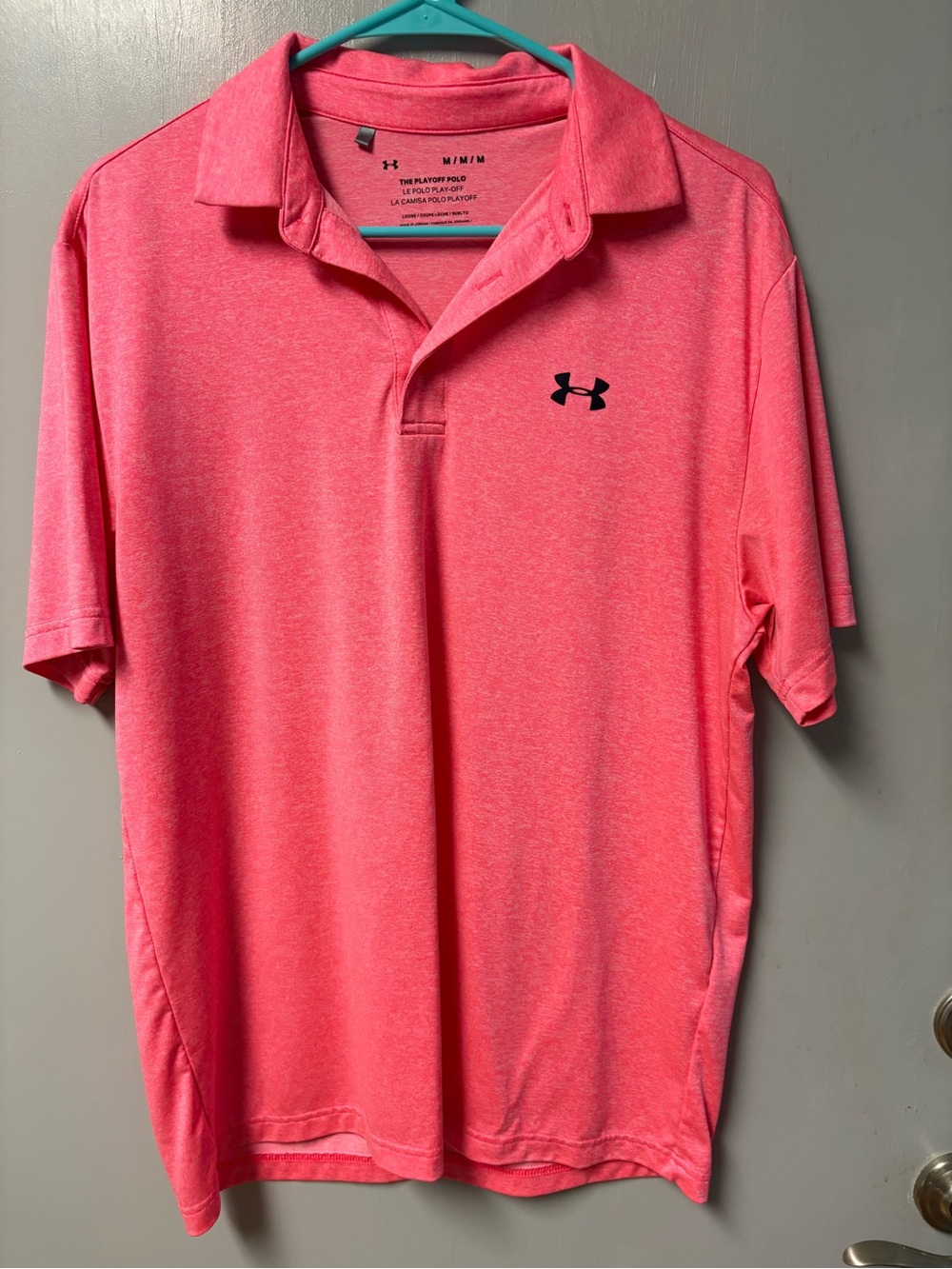 Under Armor mens golf polo size Medium.